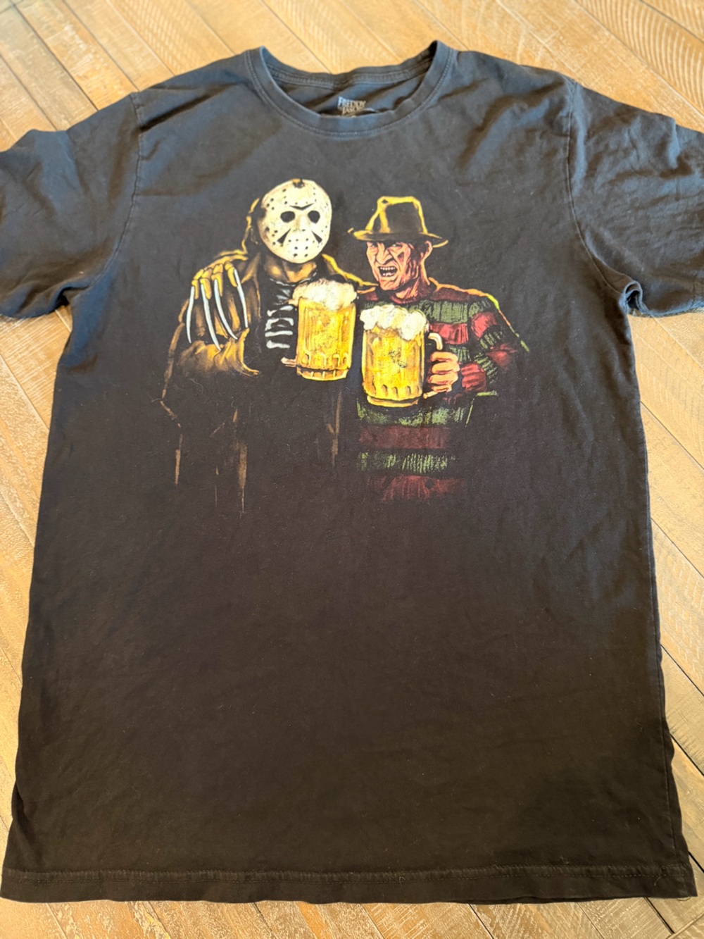 Black Short Sleeve Horror Character Graphic Tee - Beer Toast Design